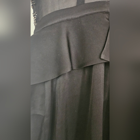 BEBE 90s Beaded top peplum mini dress. Size small - Picture 9 of 11